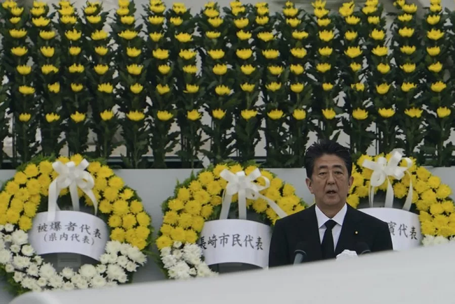 Japanese Prime Minister Shinzo Abe was at the commemoration (AP Photo/Eugene Hoshiko)