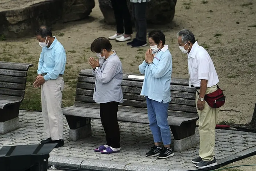 The four-ton bomb was dropped from a B-29 bomber and exploded at 8.15am. (AP Photo/Eugene Hoshiko)