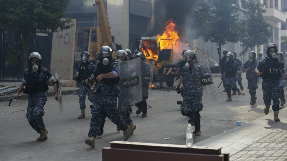 Lebanese Pm Proposes Early Elections Amid Violent Protests