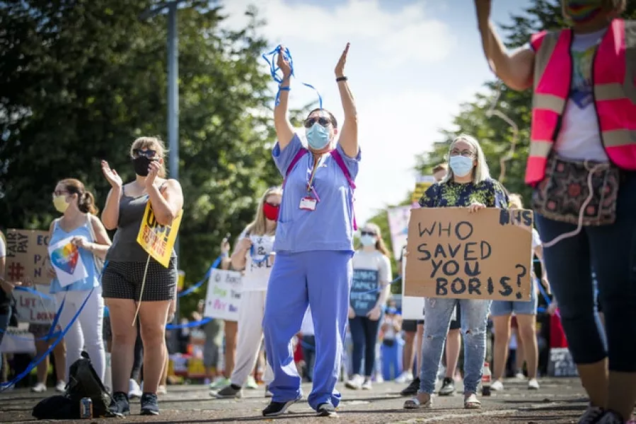 NHS workers demonstrate in Glasgow Green (Jane Barlow/PA)