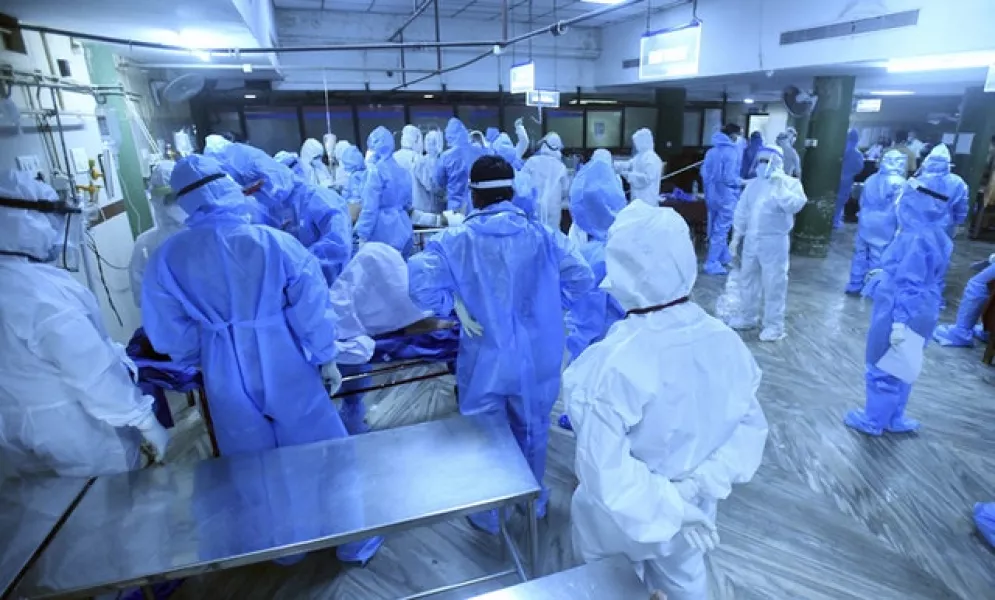 Survivors of the crash were being treated and tested for Covid-19 at the Medical College Hospital in Kozhikode (Shijith Sreedhar/AP)