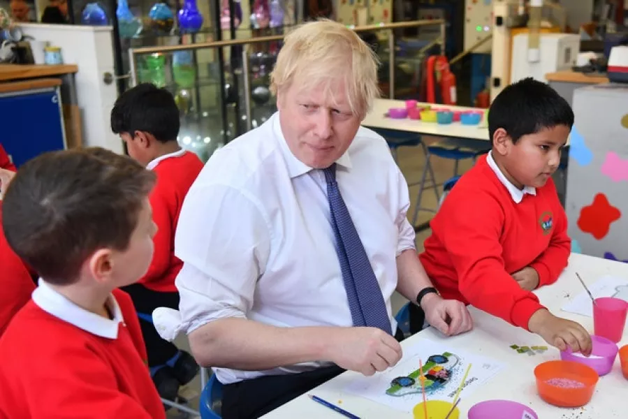 Johnson wants schools to remain open wherever possible (PA)