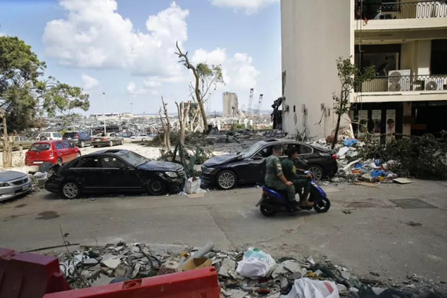 Damaged cars in a neighbourhood near the scene of Tuesday’s explosion (Thibault Camus/AP)