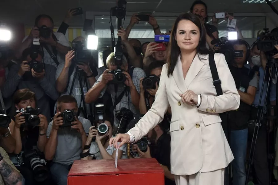 Sviatlana Tsikhanouskaya casting her ballot (AP)