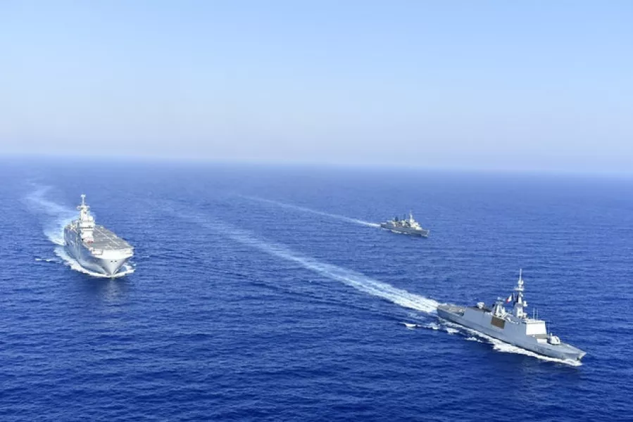A French Tonnerre helicopter carrier is escorted by Greek and French military vessels during a maritime exercise in the eastern Mediterranean (Greek National Defence/AP)