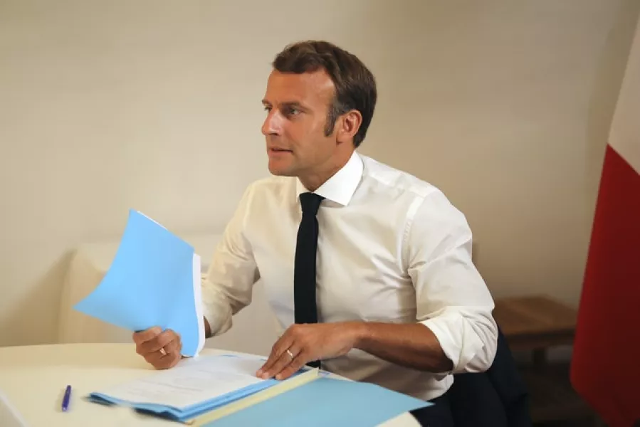 French President Emmanuel Macron has been hailed as a ‘true friend of Greece’ (Daniel Cole/AP)