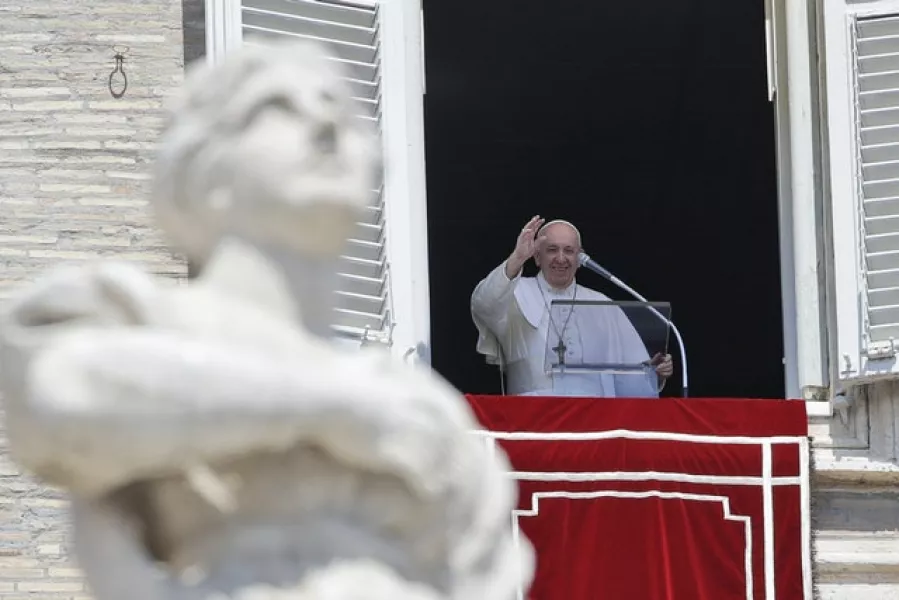 Pope Francis waves to the faithful (Alessandra Tarantino/AP)