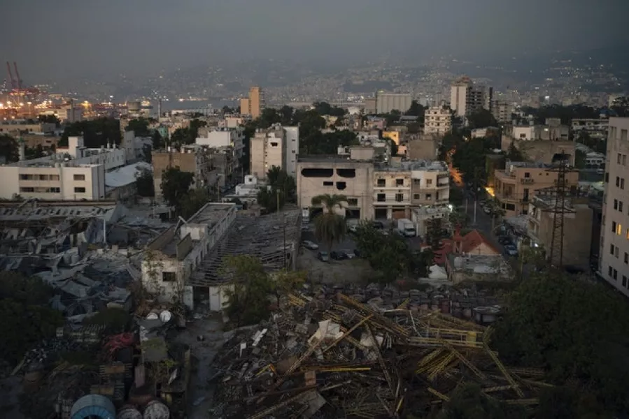 Damaged buildings near the site of last week’s massive explosion (Felipe Dana/AP)