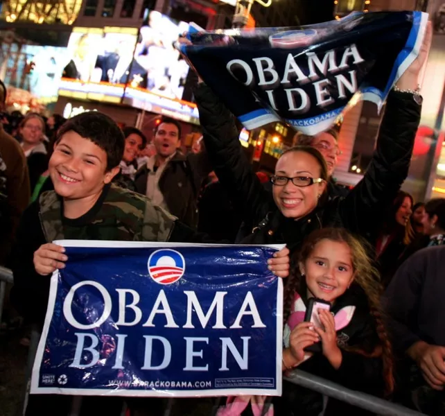 People celebrating the successful Obama-Biden campaign in New York in 2008 (Nick Potts/PA)