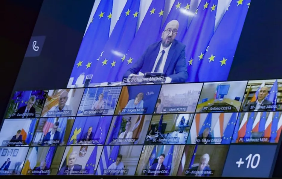 European Council president Charles Michel, top of screen, speaks with EU leaders during an EU summit in video conference format (Olivier Hoslet, Pool Photo via AP)