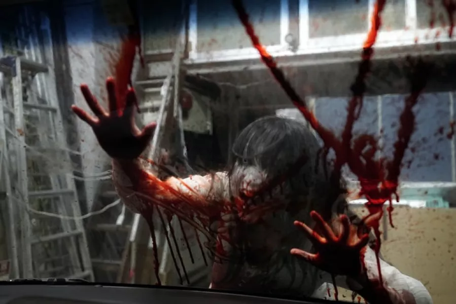 A terrifying zombie in action (Eugene Hoshiko/AP)