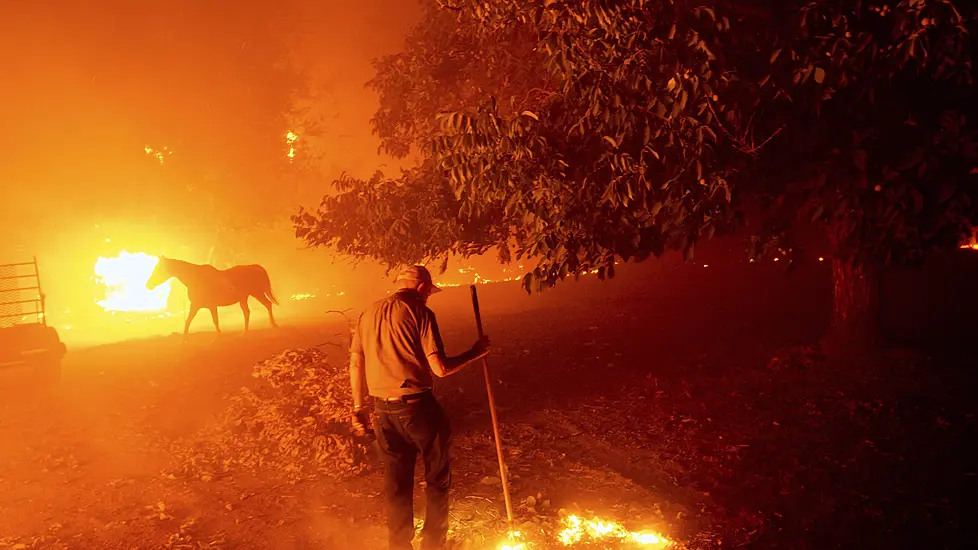 Residents Flee Homes As Wildfires Scorch Northern California