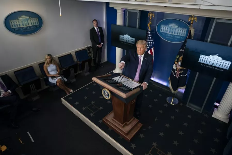 President Donald Trump spoke about QAnon on Wednesday (Evan Vucci/AP)