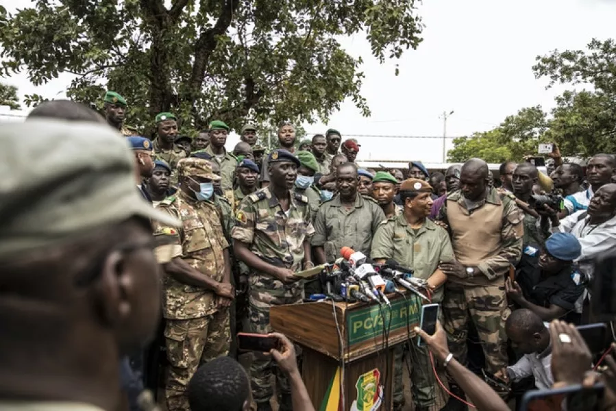 A spokesman for the soldiers identifying themselves as the National Committee for the Salvation of the People holds a press conference at Camp Soudiata in Kati (AP)