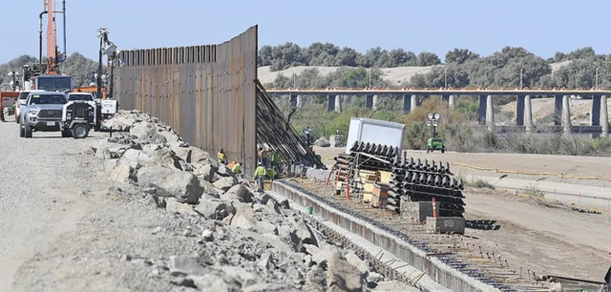 Work continues on a wall between the United States and Mexico (Randy Hoeft/AP)