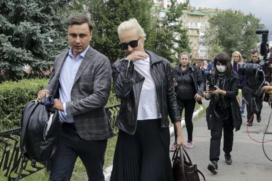 Alexei Navalny’s wife Yulia and colleague Ivan Zhdanov at the hospital (Evgeniy Sofiychuk/AP)
