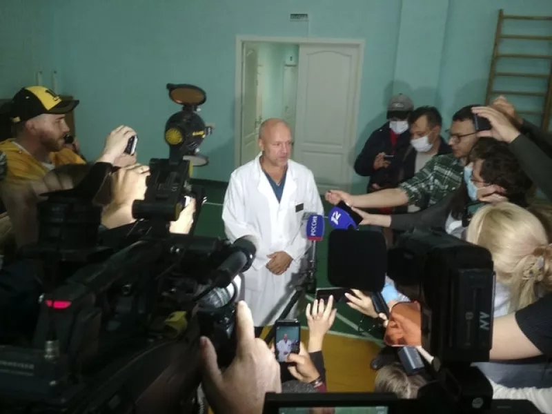 Dr Anatoliy Kalinichenko speaks to the media in Omsk (Evgeniy Sofiychuk/AP)