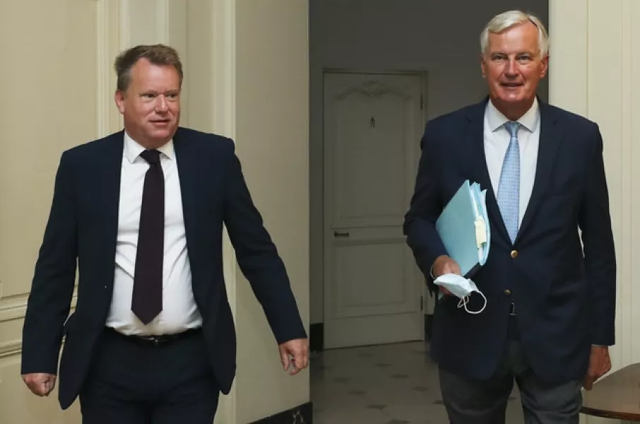 Michel Barnier, right, and David Frost arrive for the latest talks in Brussels (Yves Herman/pool/AP)