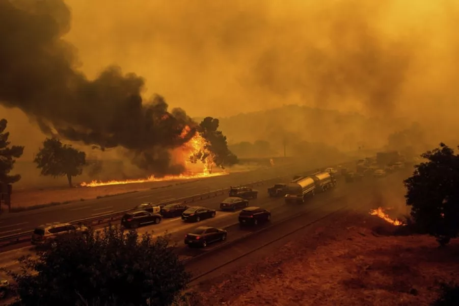Flames jump Interstate 80 in Vacaville, California (Noah Berger/AP)