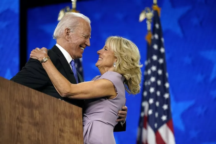 Democratic presidential candidate Joe Biden hugs his wife Jill Biden after speaking during the fourth day of the Democratic National Convention (Andrew Harnik/AP)