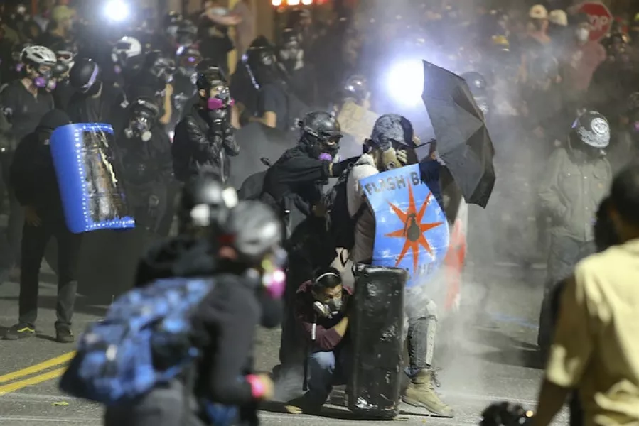 Protesters in Portland clashed with federal agents (Sean Meagher/The Oregonian/AP)