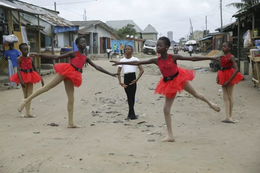 Ballet student Anthony Mmesoma Madu stands in position (Sunday Alamba/AP)