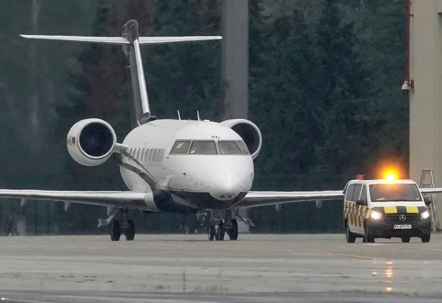 An aircraft carrying Kremlin critic Alexei Navalny arrives at Tegel Airport in Berlin (Michael Kappeler/dpa via AP)