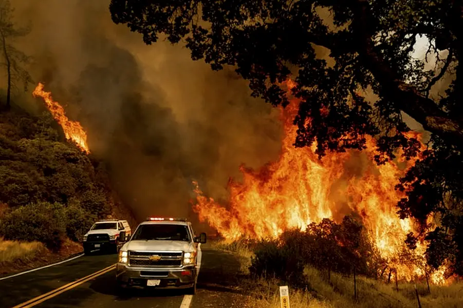 The LNU Lightning Complex fire has killed four people and destroyed 845 structures (Noah Berger/AP)