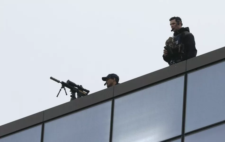 Police marksmen man the roof of Christchurch High Court as the sentencing hearing gets underway (Mark Baker/AP)