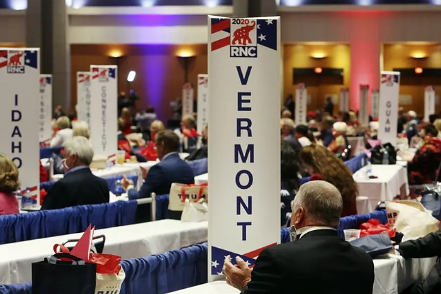 Delegates applaud as they vote on the first day of the RNC (Travis Dove/The New York Times via AP, Pool)