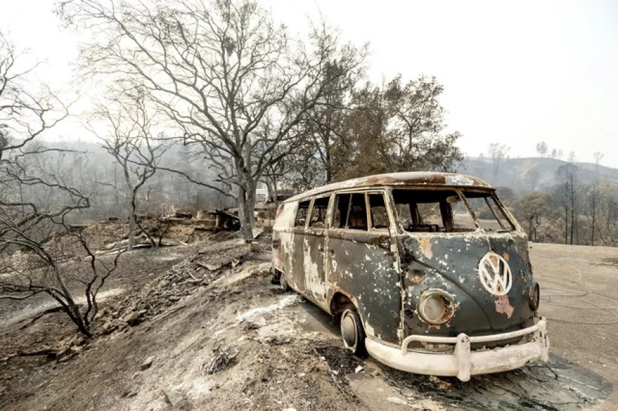 A VW Microbus sits among the wreckage from the LNU Lightning Complex fires (Noah Berger/AP)