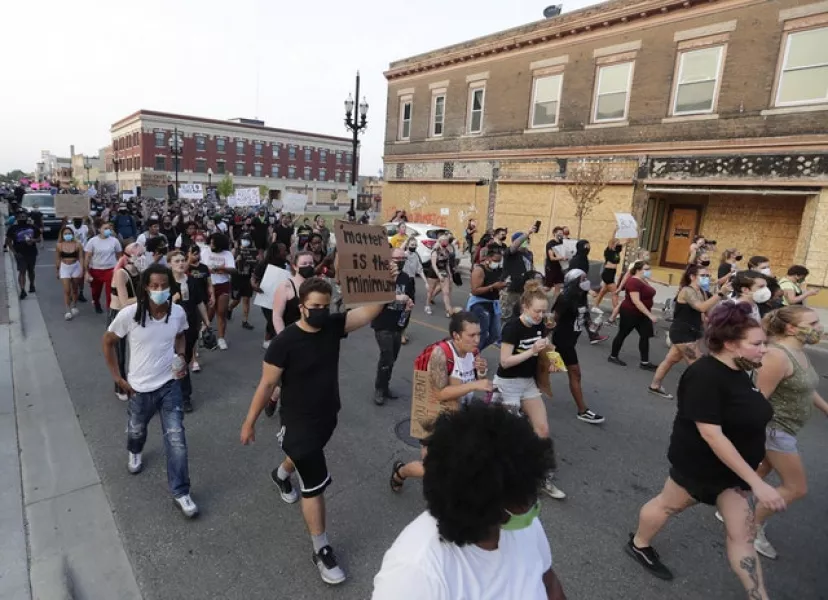 Protesters march in Kenosha in response to the shooting of Jacob Blake (Rick Wood/Milwaukee Journal-Sentinel via AP)