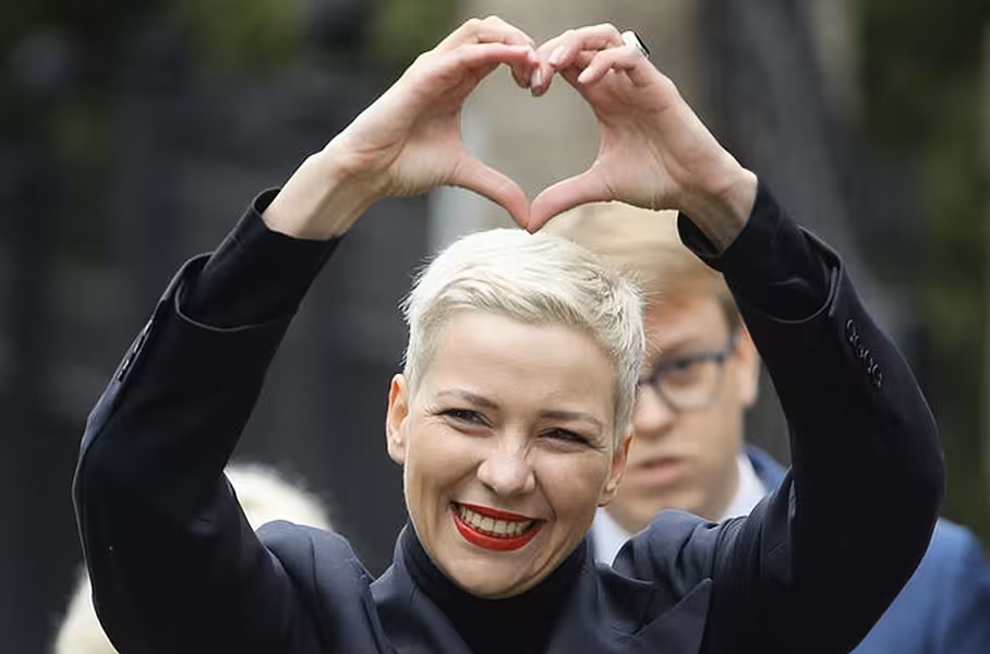 Maria Kolesnikova, one of Belarus’s opposition leaders, gestures to protesters outside the Belarusian Investigative Committee in Minsk (Dmitri Lovetsky/AP)