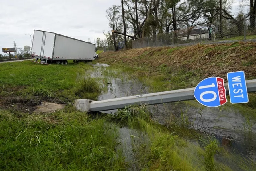 A truck plunged off Interstate 10 amid severe conditions in Louisiana (Gerald Herbert/AP)