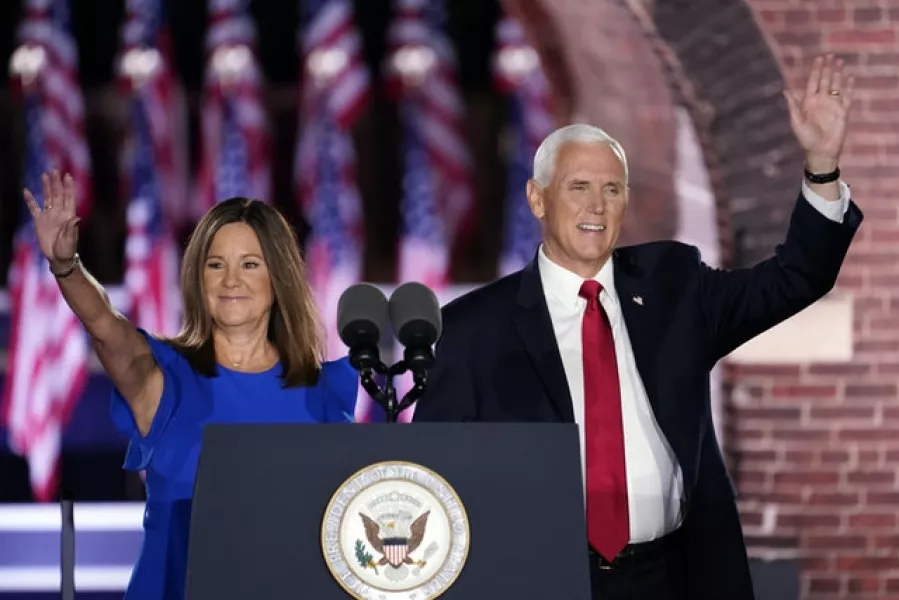 Vice President Mike Pence arrives with his wife Karen Pence to speak on the third day of the Republican National Convention (Andrew Harnik/AP)