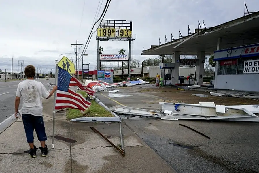 Debris is left on a road in Lake Charles after Hurricane Laura made landfall in Louisiana (Gerald Herbert/AP)