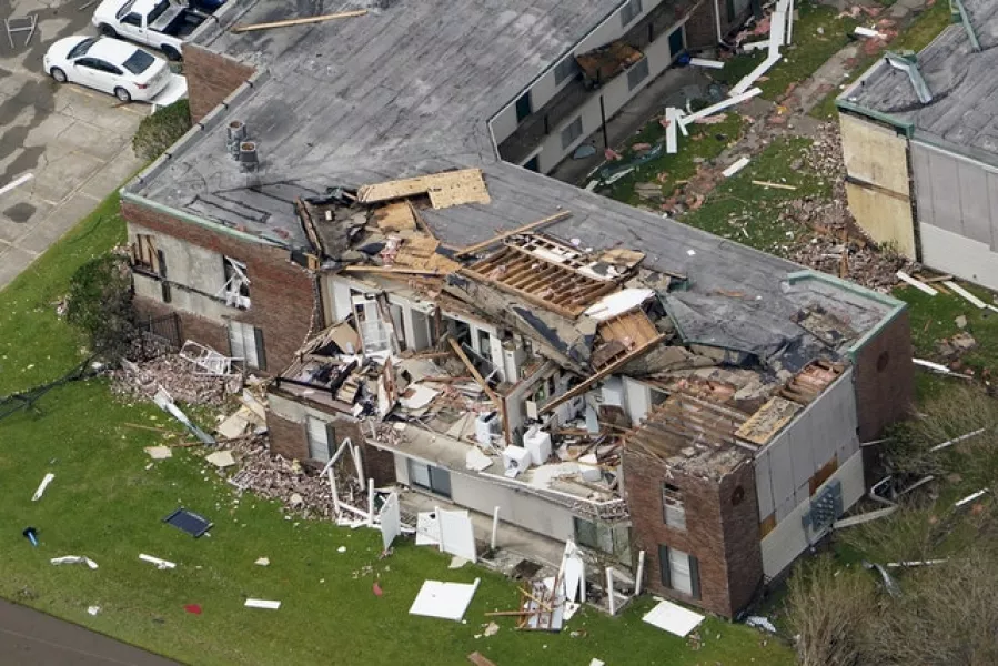 An apartment building was badly damaged (David J. Phillip/AP)