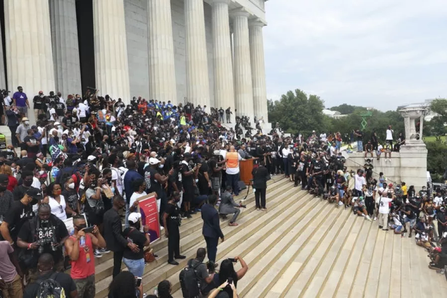People gather at the Lincoln Memorial (AP)