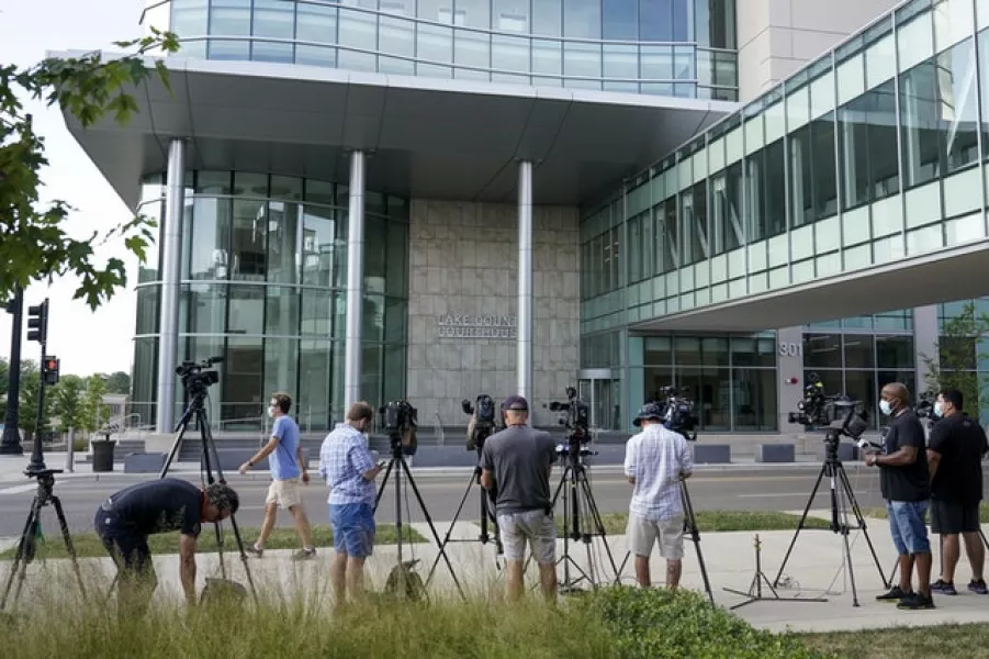 TV cameras set up outside the Lake County courthouse for the extradition hearing for Kyle Rittenhouse (AP)