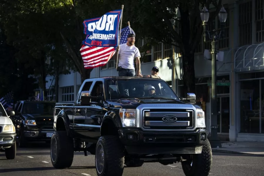 Donald Trump supporters attend a rally and car parade from Clackamas to Portland (Paula Bronstein/AP)