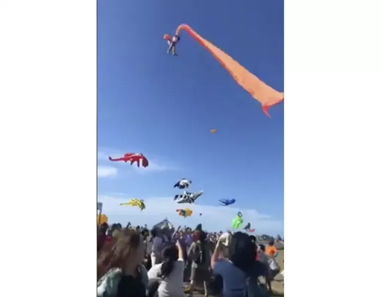 In this image made from video, a three-year-old girl is lifted into the air by a large kite in Taiwan. Photo: Dainese Hsu