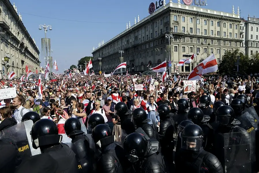 Police and protesters in the centre of Minsk (AP)