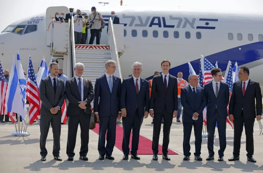 Jared Kushner and other dignitaries prepare to board the flight (Menahem Kahana/via AP)