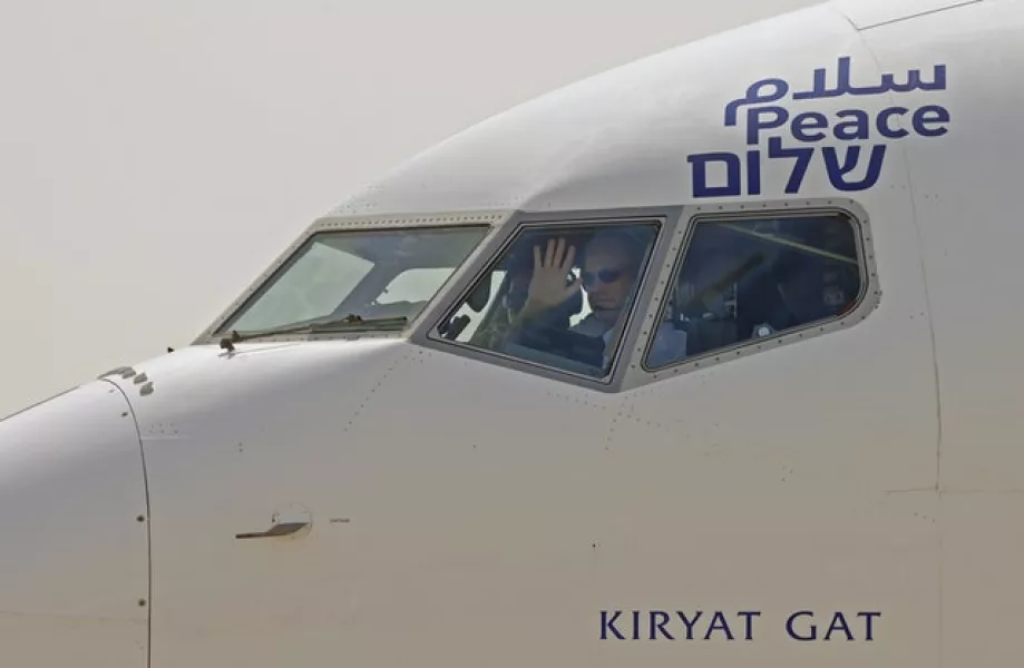 The plane was decorated with the the words for peace in Arabic, Hebrew and English above the pilot’s window (Menahem Kahana/Pool via AP)