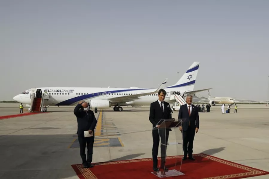 Jared Kushner, centre, after the El Al plane landed in Abu Dhabi (Nir Elias/Pool Photo via AP)