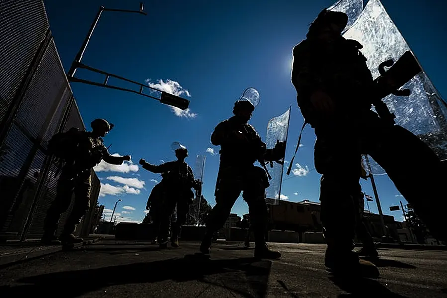 Wisconsin National Guard troops arrive at the Kenosha County courthouse (AP)