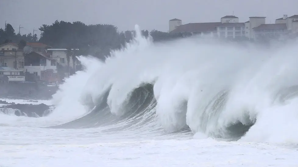 Rains Hit Southern Japanese Island As Koreas Prepare For Typhoon