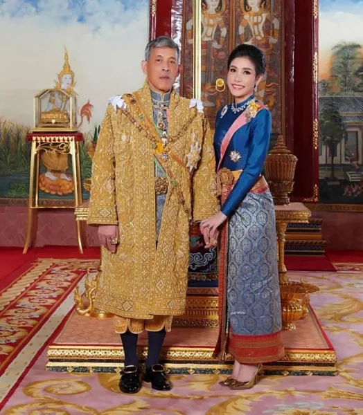King Maha Vajiralongkorn, with Major General Sineenatra Wongvajirabhakdi (Thailand Royal Office via AP)
