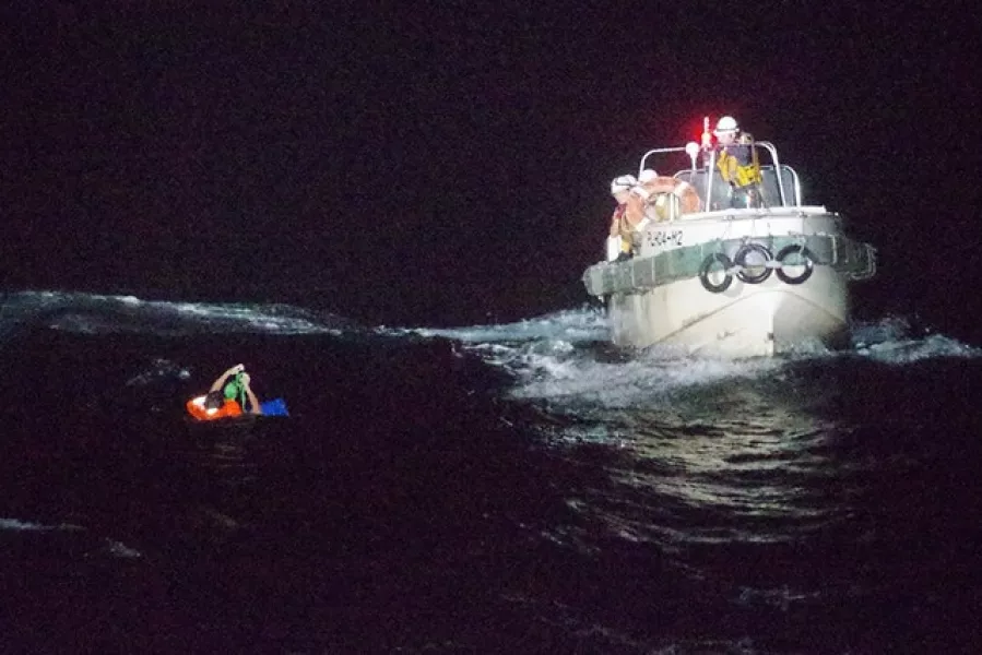 The first man was rescued early on Wednesday (The 10th Regional Japan Coast Guard Headquarters/AP)