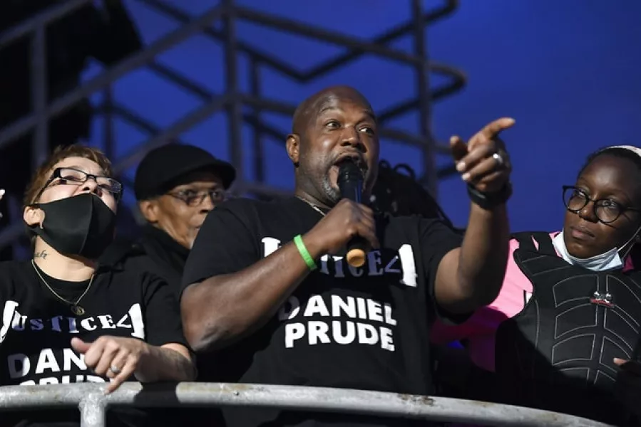 Daniel Prude’s brother Joe speaks to the crowd gathered during the rally on Friday (Adrian Kraus/AP)